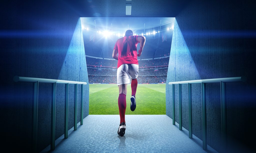 running football player and stadium